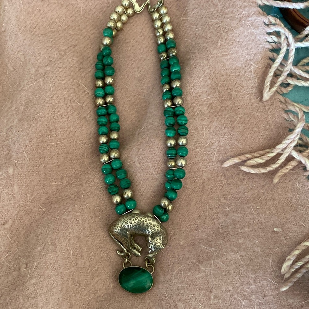 Malachite leopard necklace with silver beads.